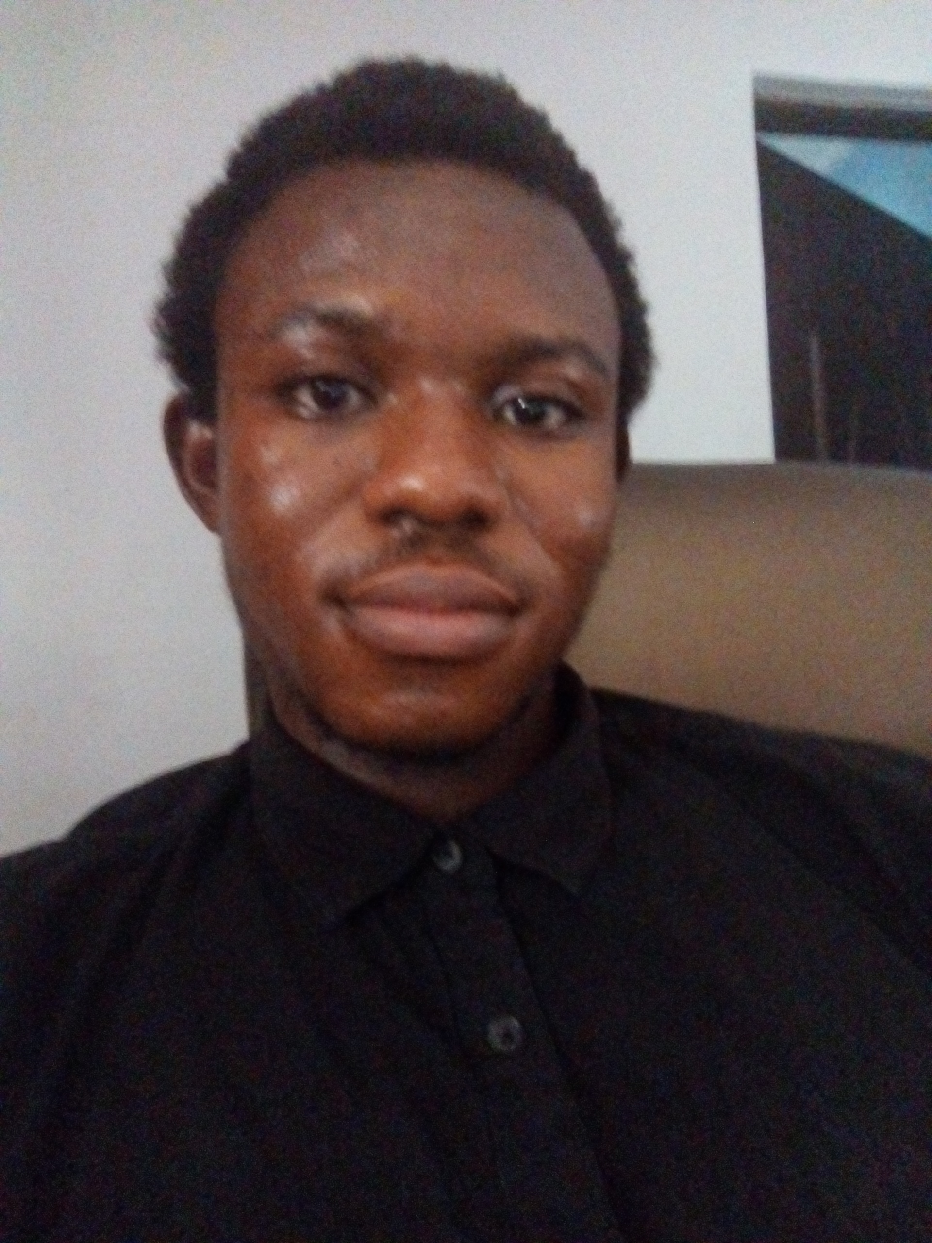 Image taken by me,in my house,putting on a black shirt